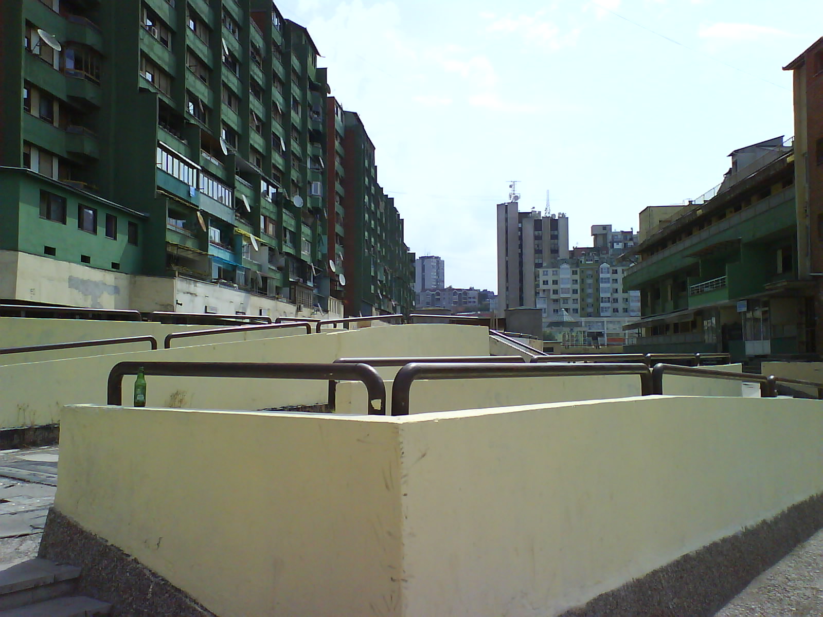 Apartment buildings in Dardania, Prishtina, photographed in 2007 by Sanmint. Public domain.