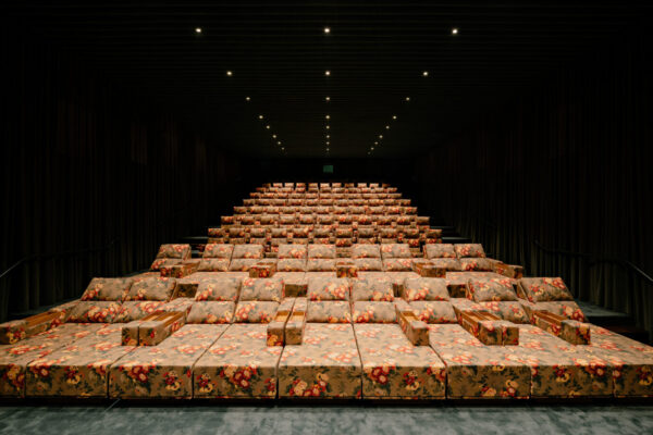 Floral seating in the Cine Tutu auditorium by Isay Weinfeld. Photograph: Fran Parente.
