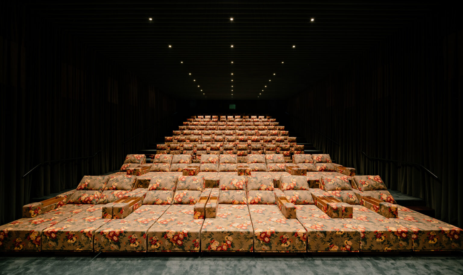 Floral seating in the Cine Tutu auditorium by Isay Weinfeld. Photograph: Fran Parente.