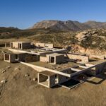 Aerial view of Perma Serifos residences on the rocky slope