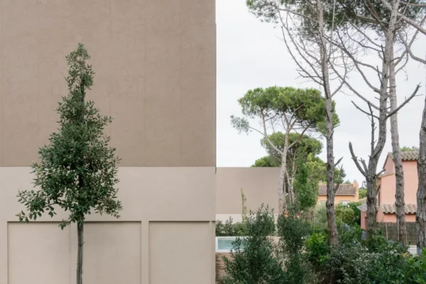 Pinewood House facade among trees on the Costa Brava