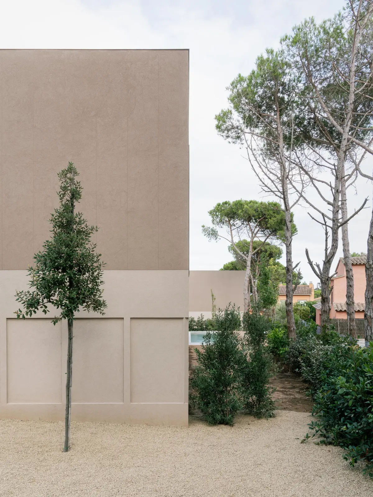 Pinewood House facade among trees on the Costa Brava