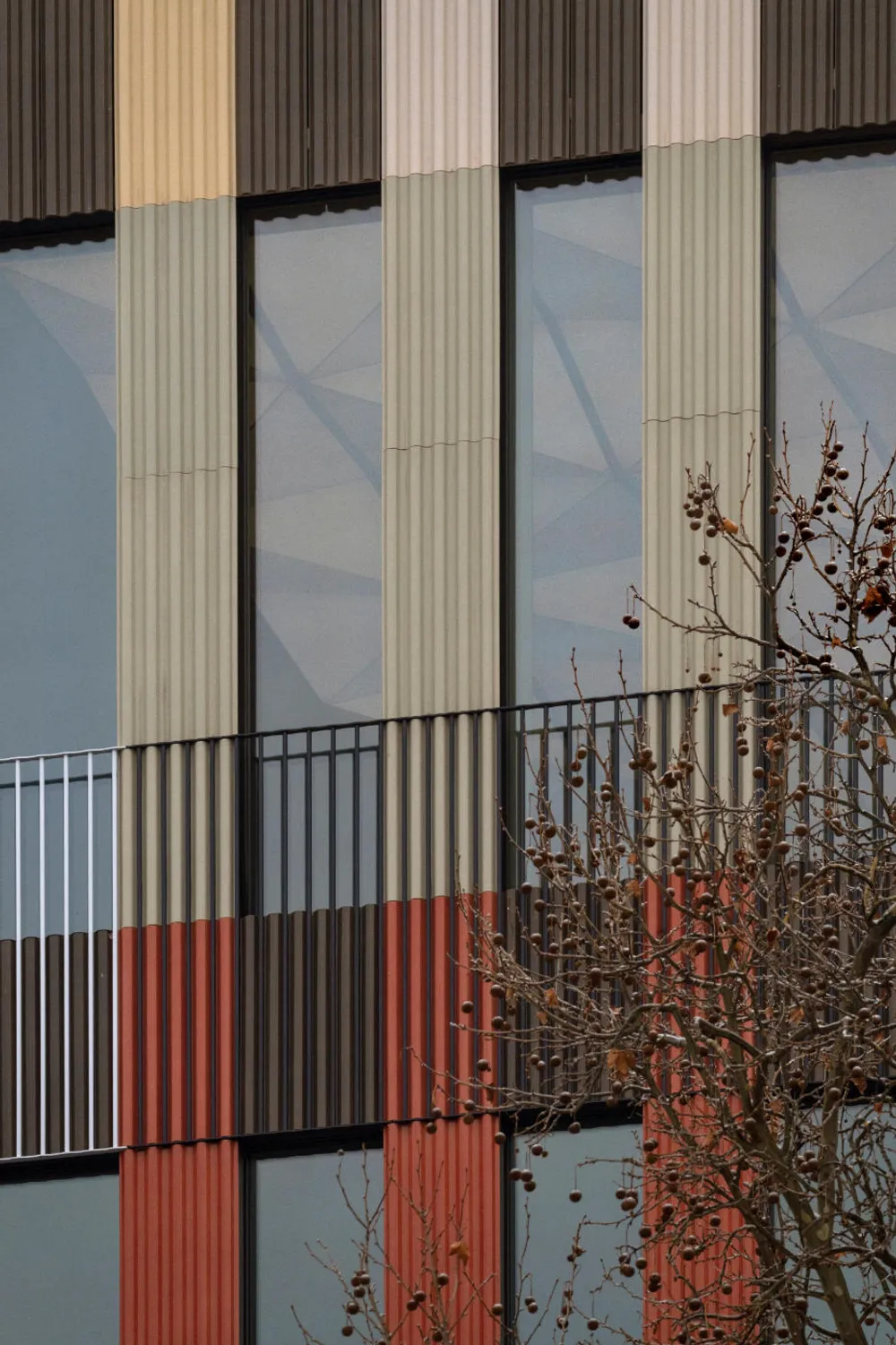 Fluted ceramic facade and railings, photograph by Jan Bitter