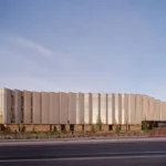 Central Library at Stevens Ranch with a faceted metal facade above a stone base