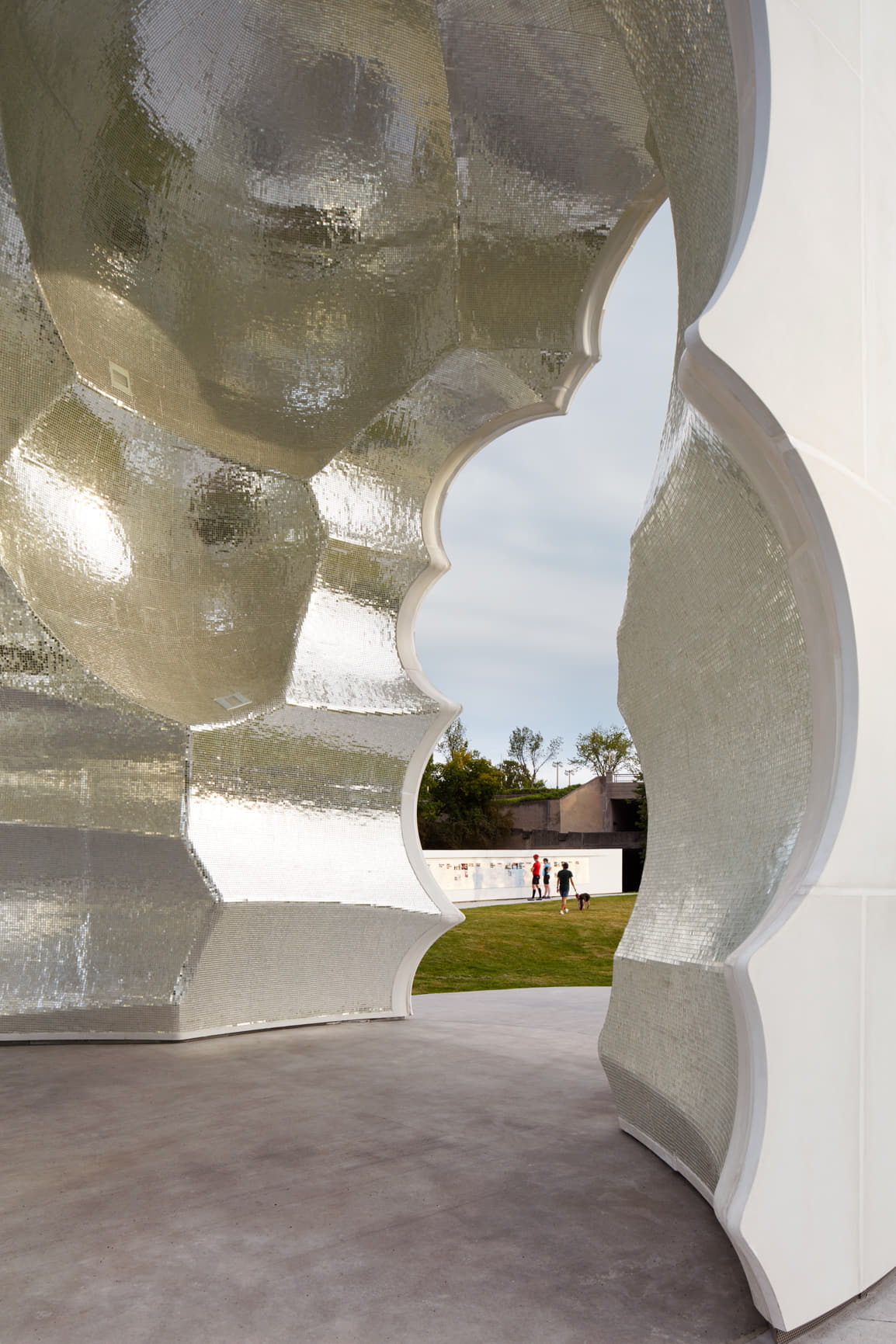 Open threshold between Thunderhead's mirrored interior and surrounding park