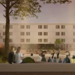 Evening visualization of Trace's sunken amphitheatre, with stepped seating, trees, and cultural pavilion in Peja