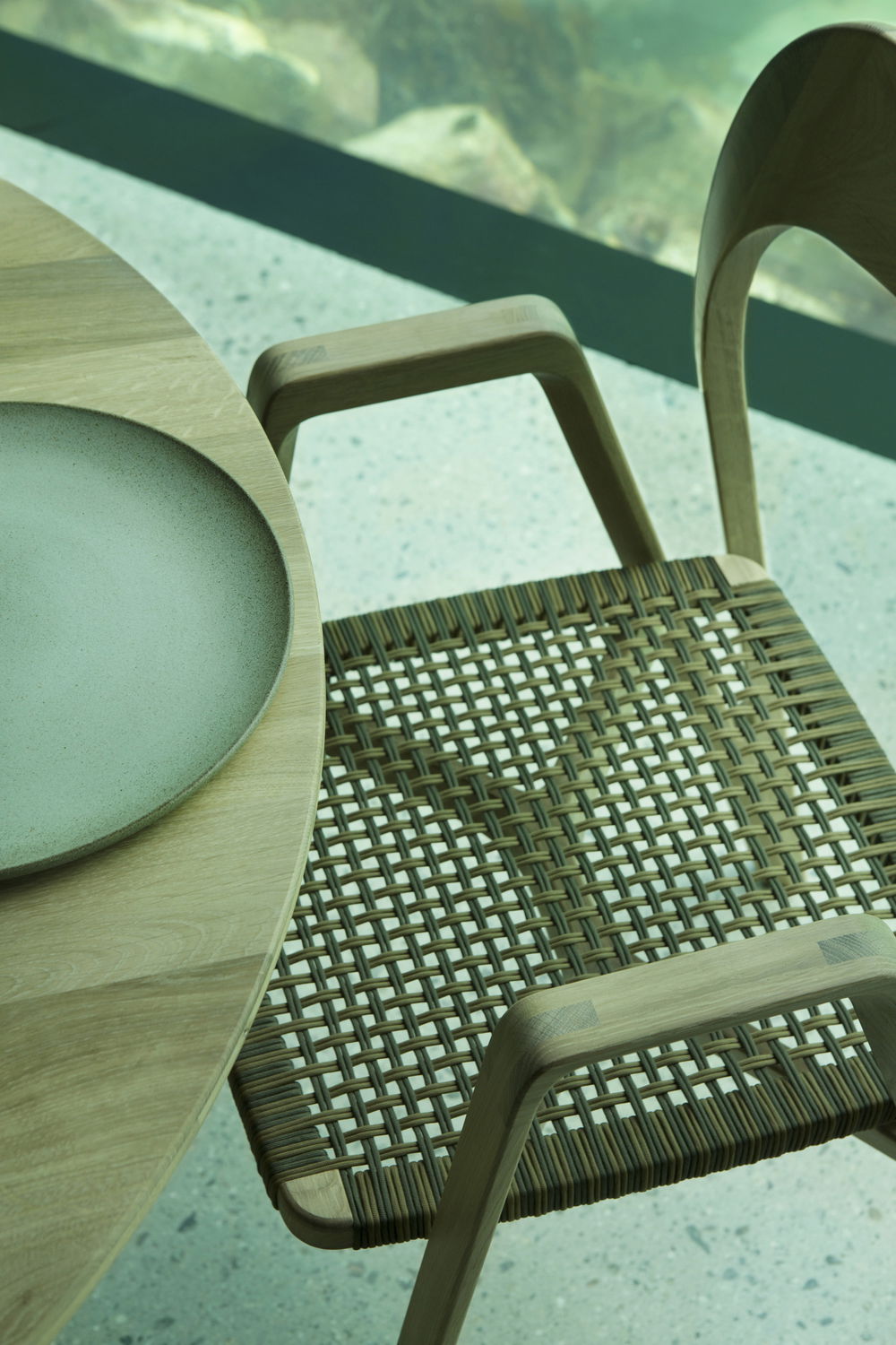 Furniture designed for Under restaurant by Snøhetta.